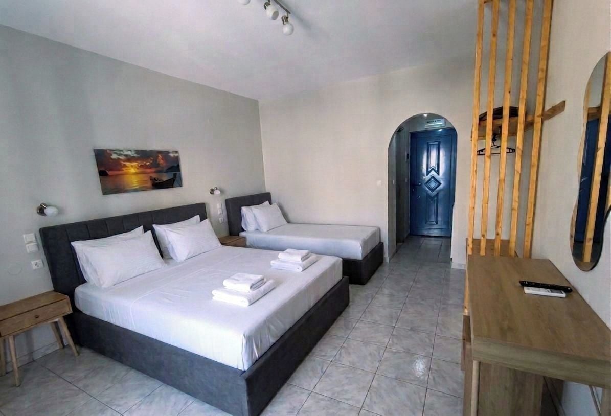 Basic Triple Room, 3 Single Beds | Desk, blackout curtains, iron/ironing board, free cots/infant beds