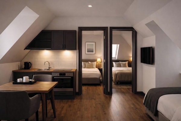 Deluxe studio suite, Meerdere bedden, keuken | Een bureau, een laptopwerkplek, geluiddichte muren, gratis wifi