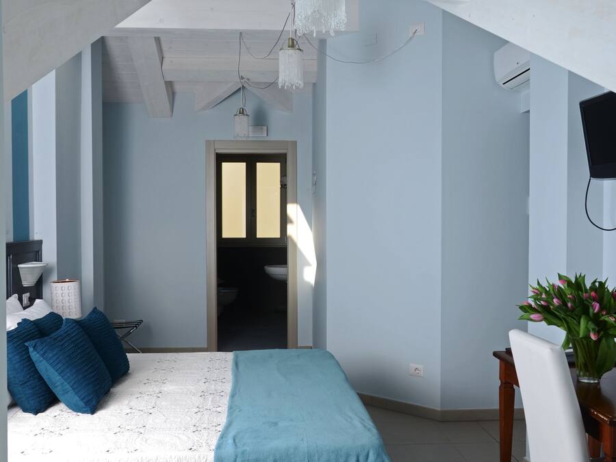 SuiteTripla | Roupas de cama antialérgicas, cofres nos quartos, escrivaninha