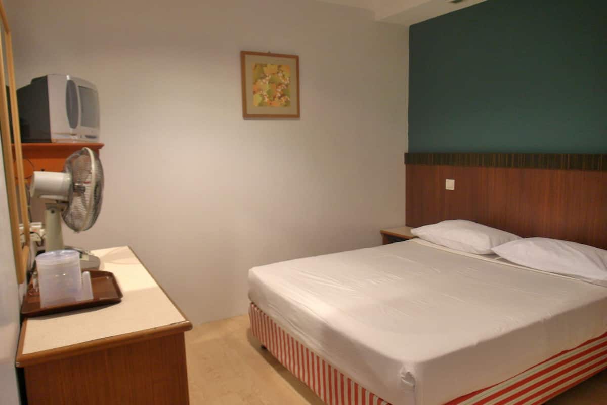 Economy Room, No windows | 1 bedroom, in-room safe, desk, iron/ironing board (on request)
