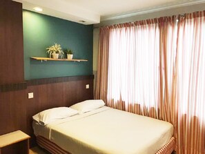 Deluxe Room, 1 Double Bed  | 1 bedroom, in-room safe, desk, iron/ironing board