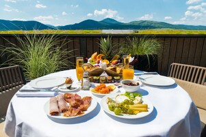 Daily buffet breakfast (EUR 27 per person)
