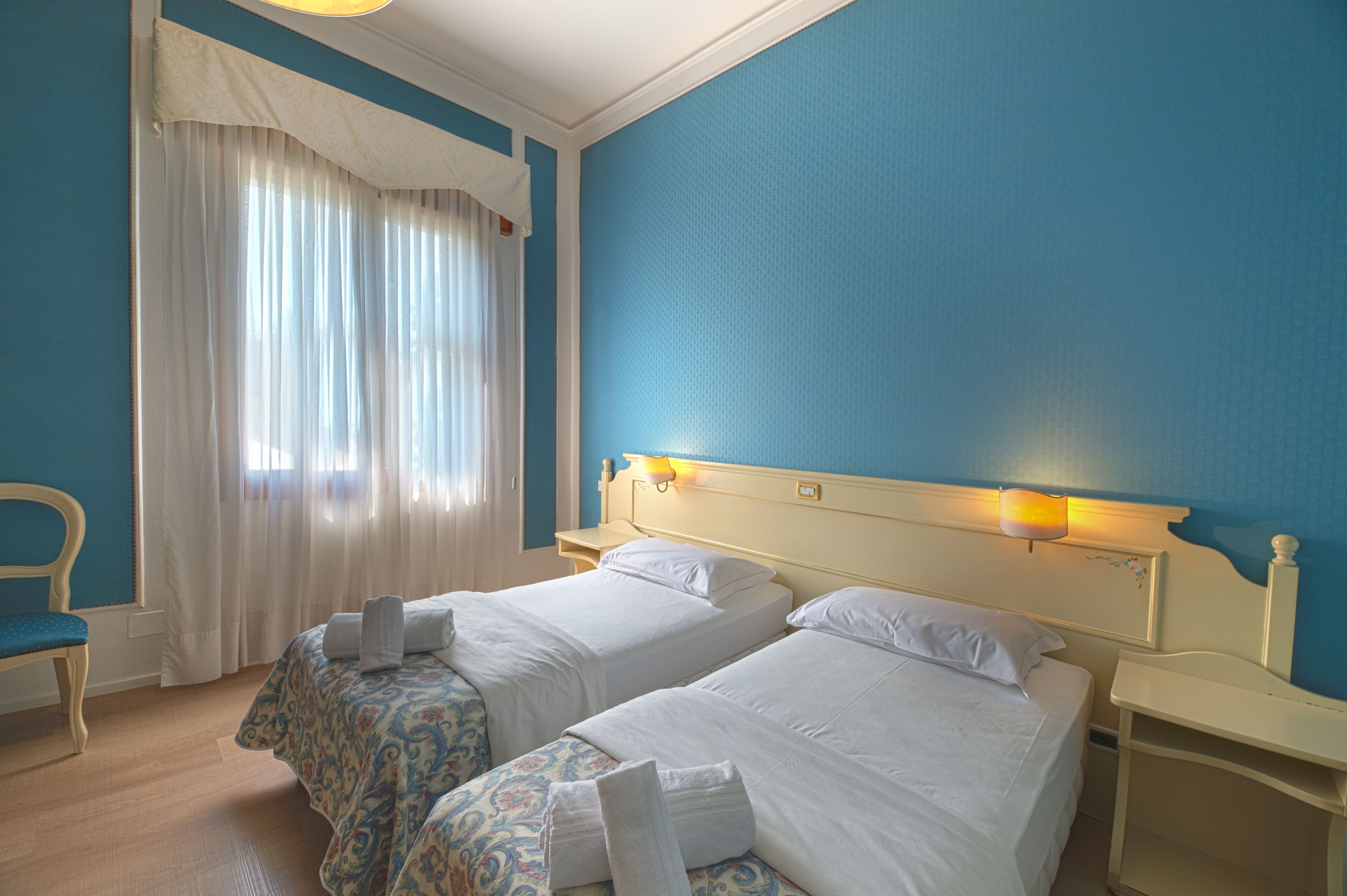 superior double or twin room | minibar, in-room safe, desk, laptop workspace