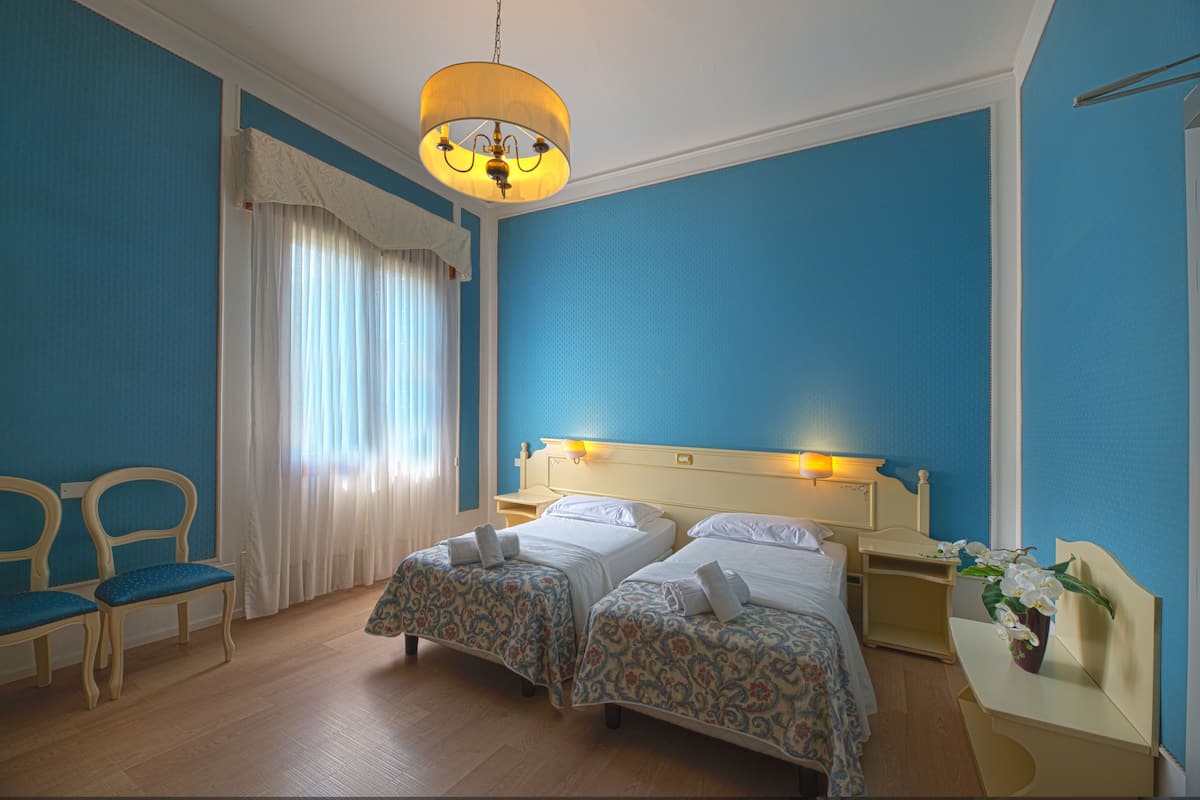 Romantic Double or Twin Room | Minibar, in-room safe, desk, laptop workspace