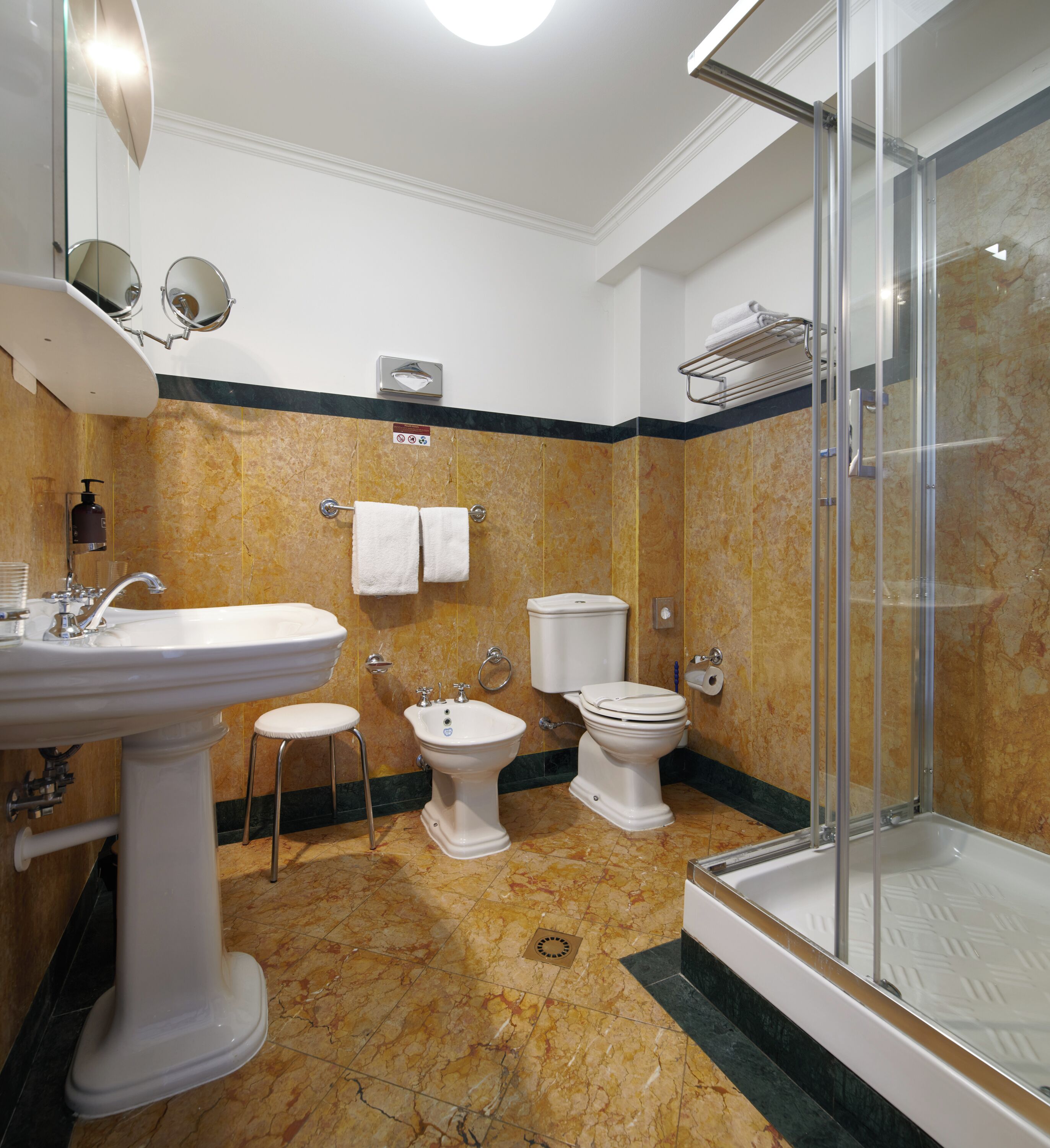 free toiletries, hair dryer, bidet, towels