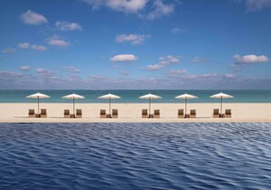Outdoor pool, pool umbrellas, pool loungers