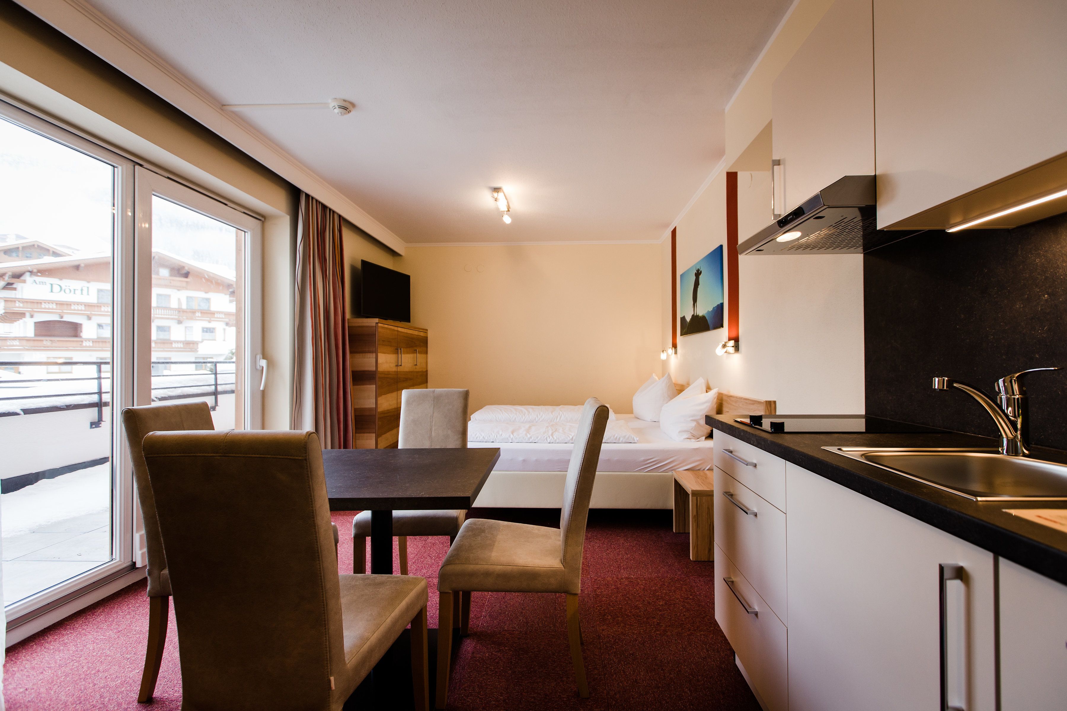 superior studio, kitchen, mountain view | in-room safe, soundproofing, cots/infant beds, free wifi