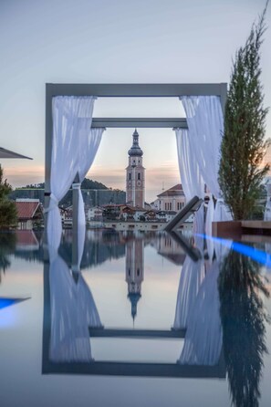 Indoor pool, outdoor pool, open 8:00 AM to 8:00 PM, pool umbrellas