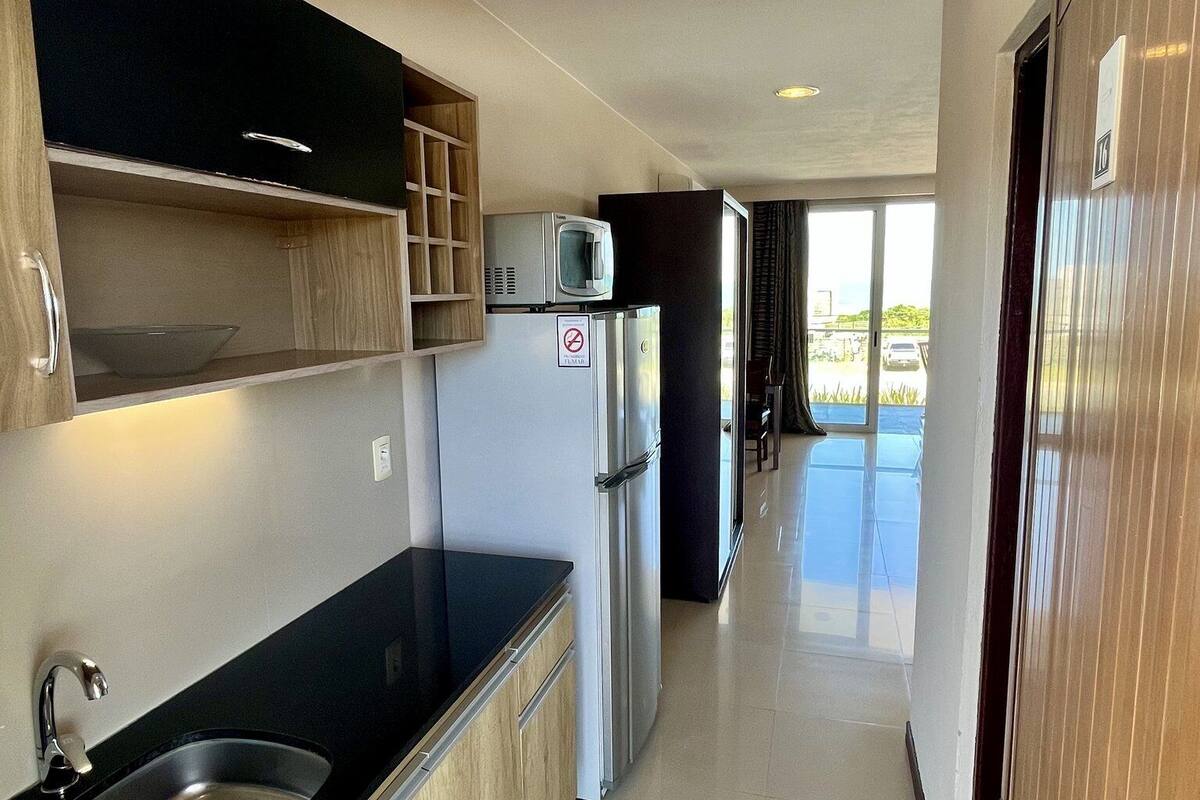 superior room | private kitchen | full-sized fridge, microwave, stovetop, cookware/dishes/utensils