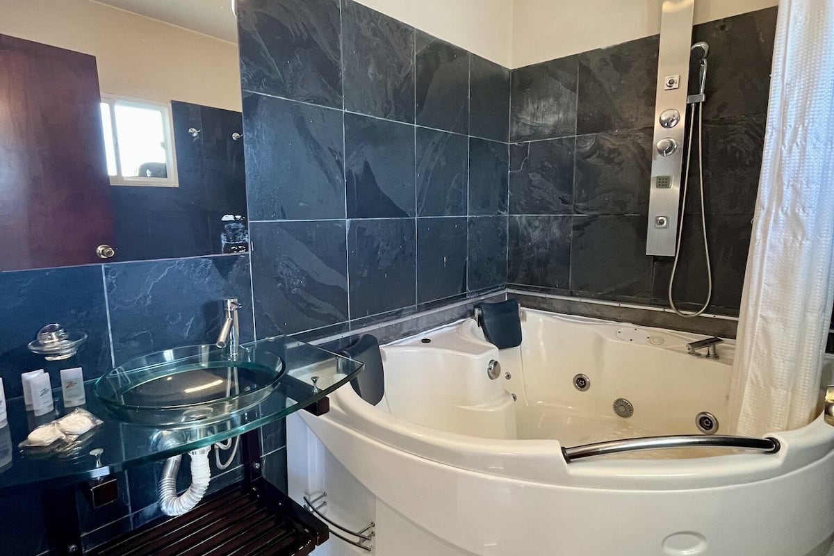 superior room | bathroom | shower, free toiletries, hair dryer, bidet