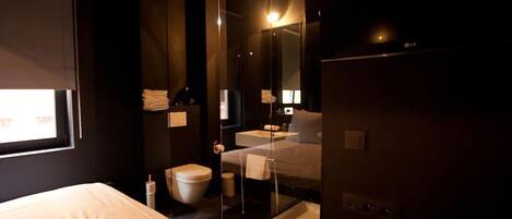 Premium bedding, down comforters, pillowtop beds, in-room safe