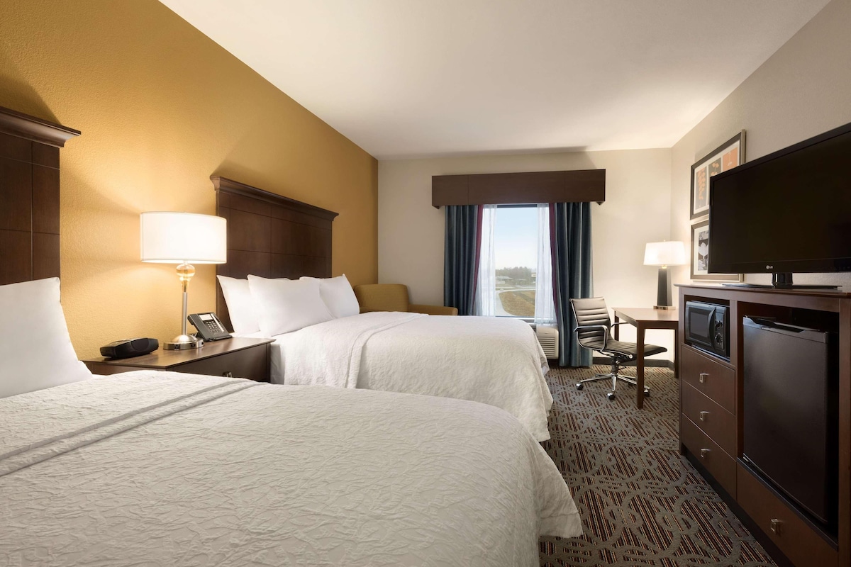 Premium bedding, pillowtop beds, desk, blackout drapes