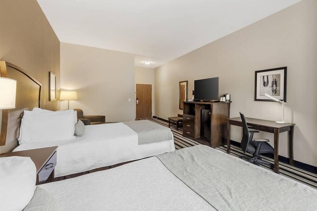 Premium bedding, pillowtop beds, desk, laptop workspace