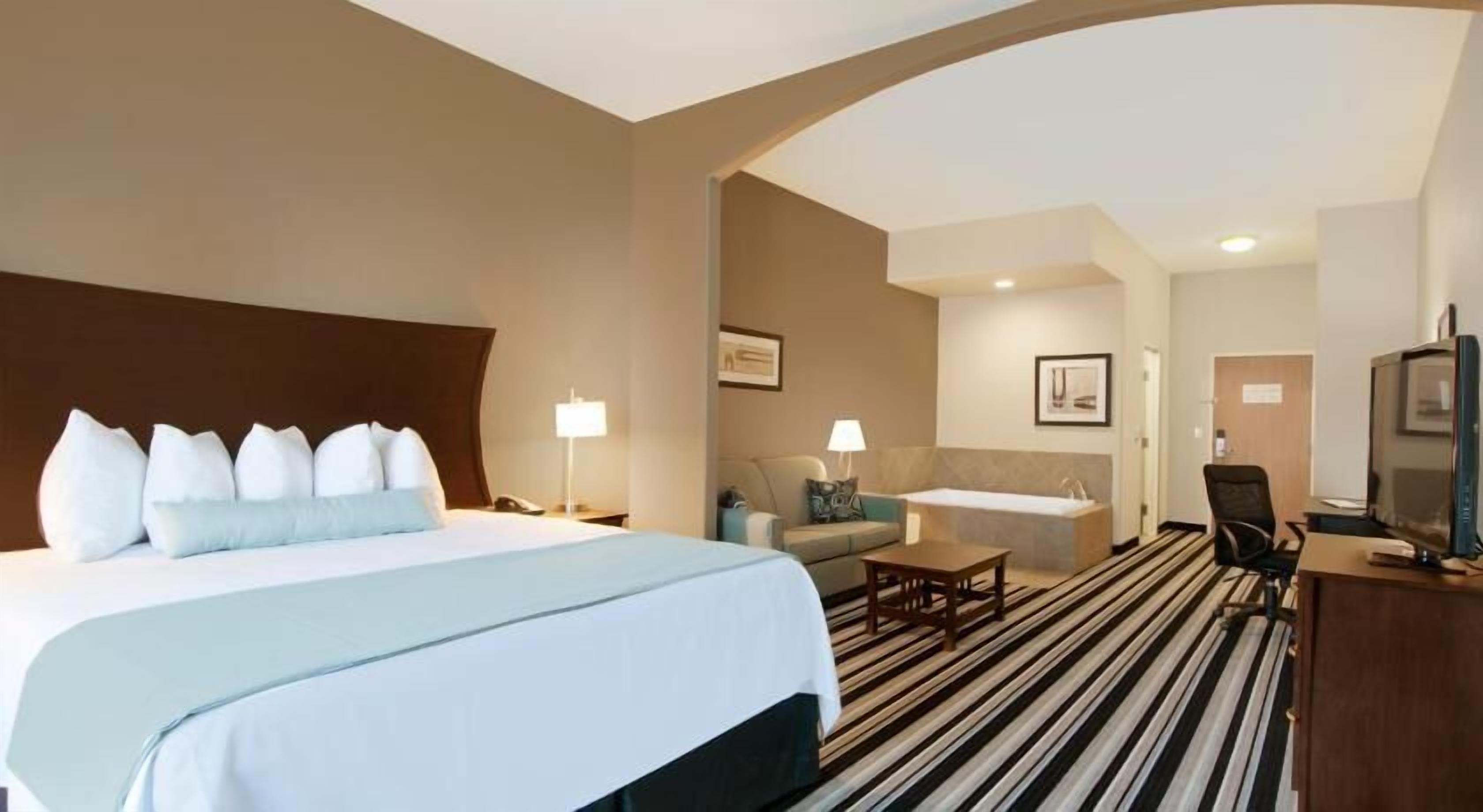 Premium bedding, pillowtop beds, desk, laptop workspace