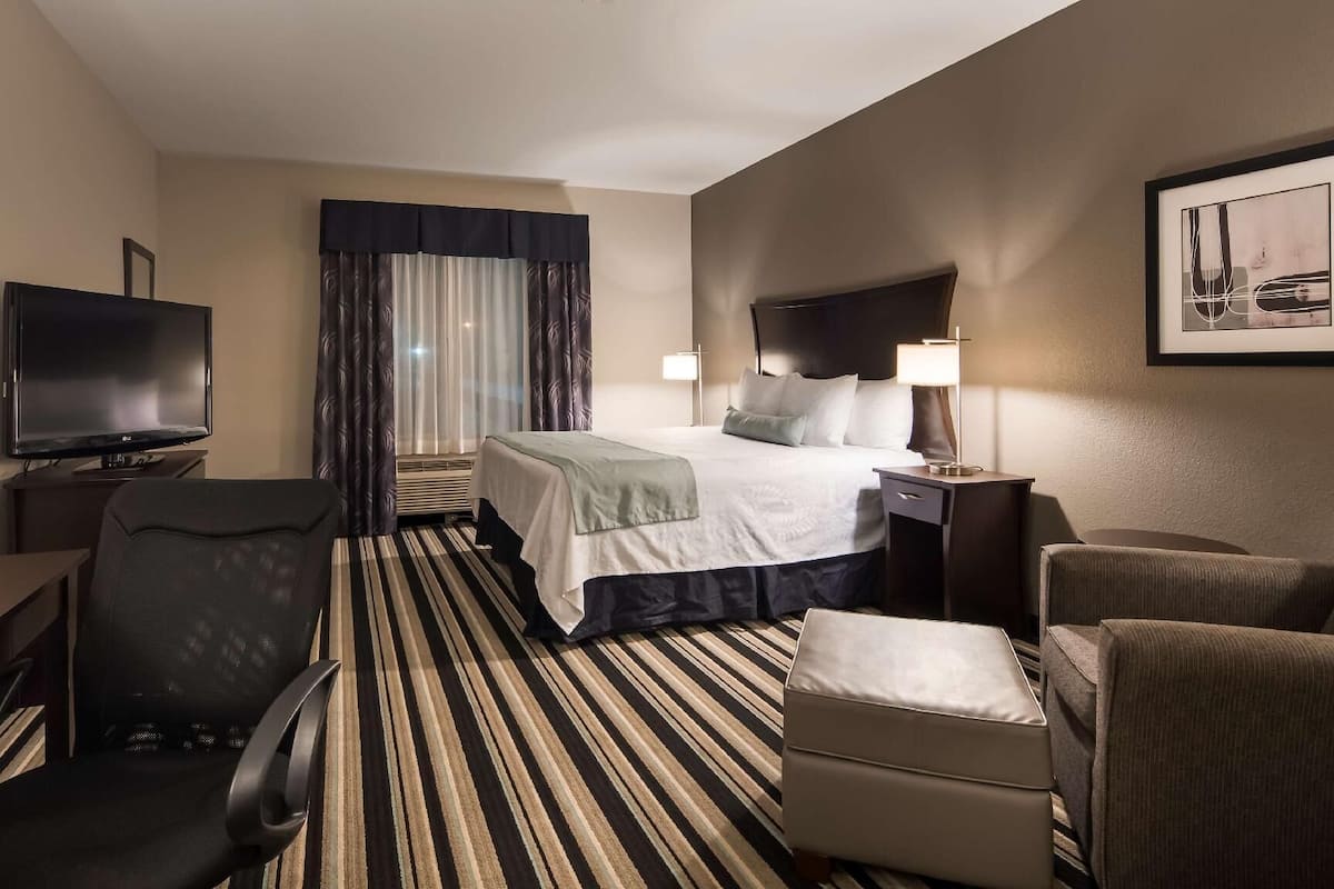 Premium bedding, pillow-top beds, desk, laptop workspace