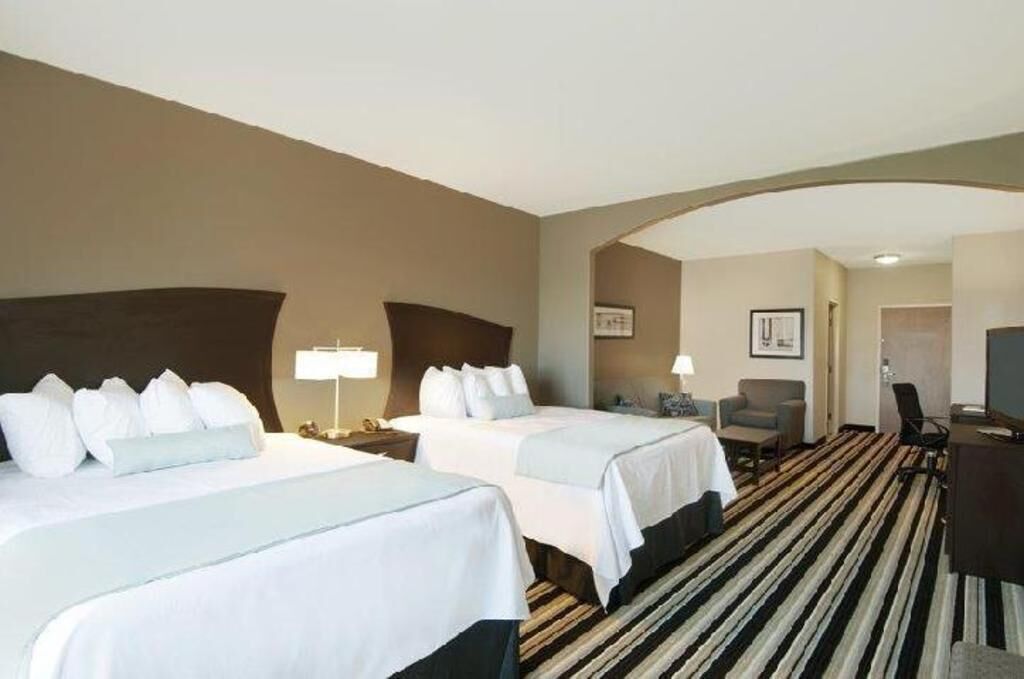 Premium bedding, pillowtop beds, desk, laptop workspace
