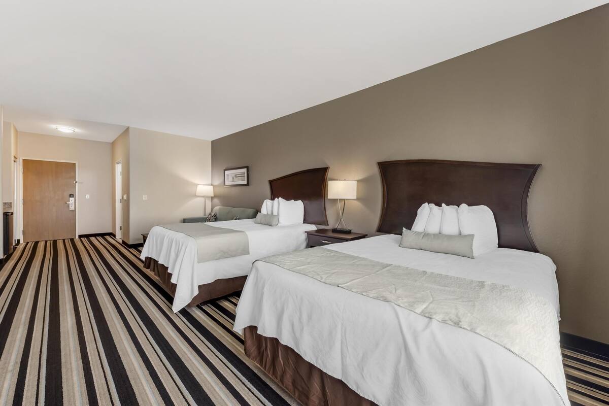 Premium bedding, pillowtop beds, desk, laptop workspace