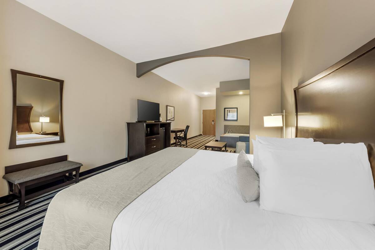 premium bedding, pillow-top beds, desk, laptop workspace