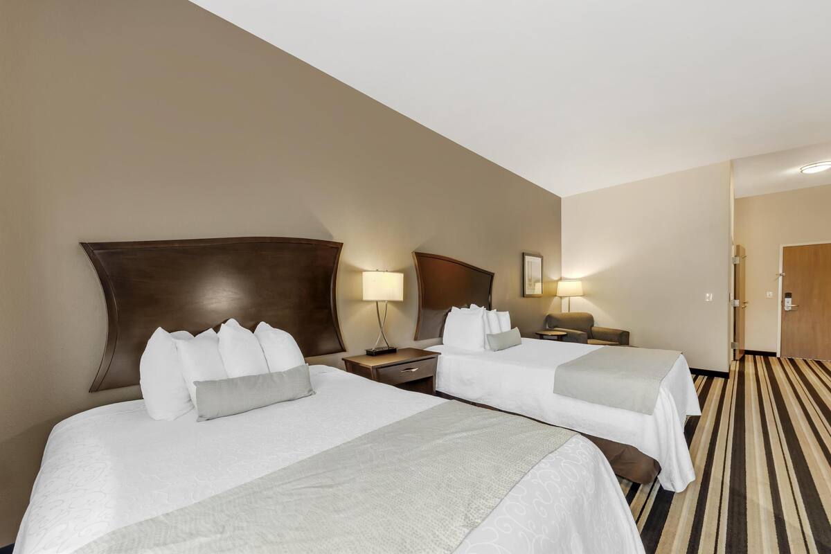 Premium bedding, pillowtop beds, desk, laptop workspace