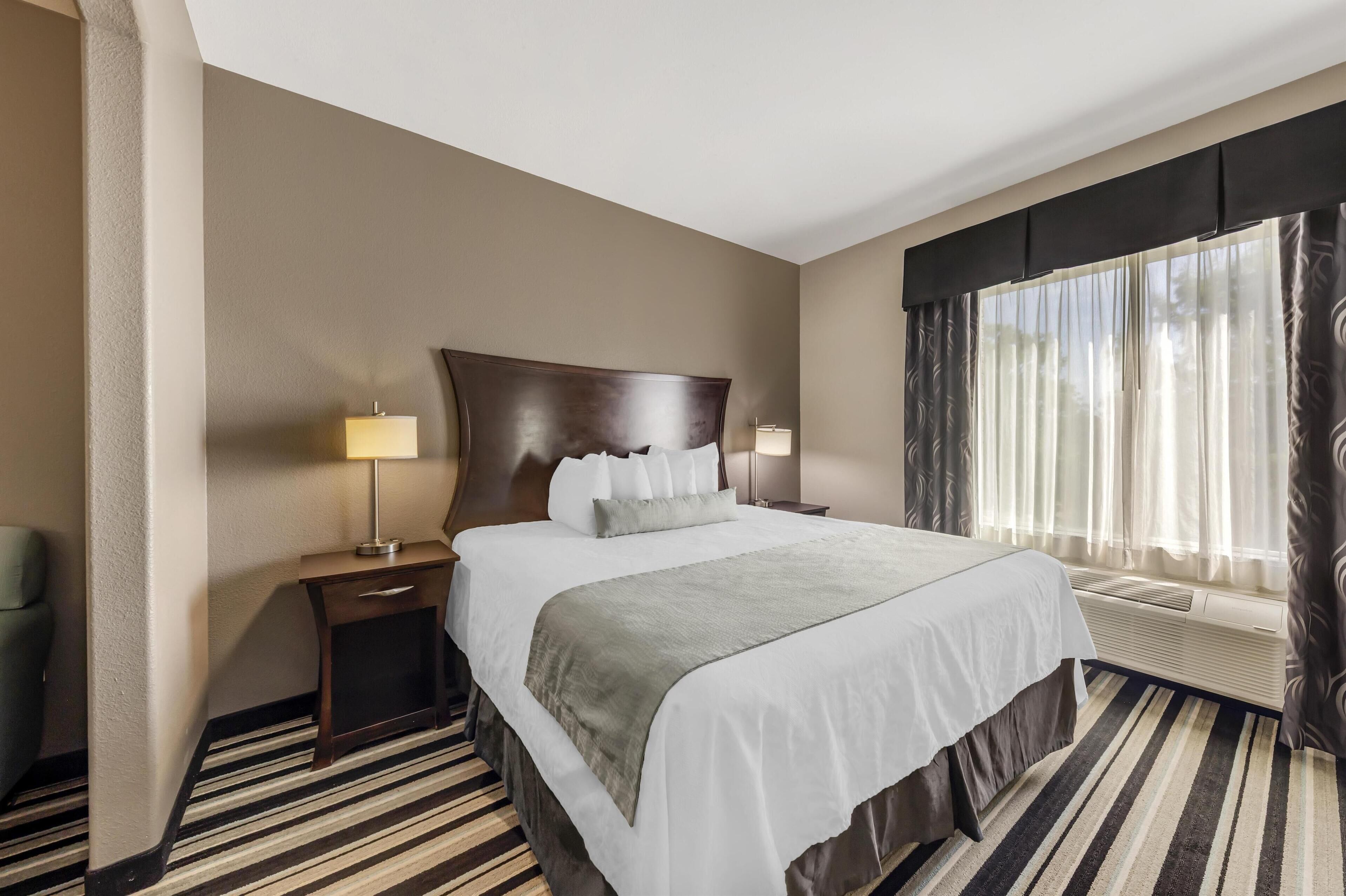 premium bedding, pillow-top beds, desk, laptop workspace