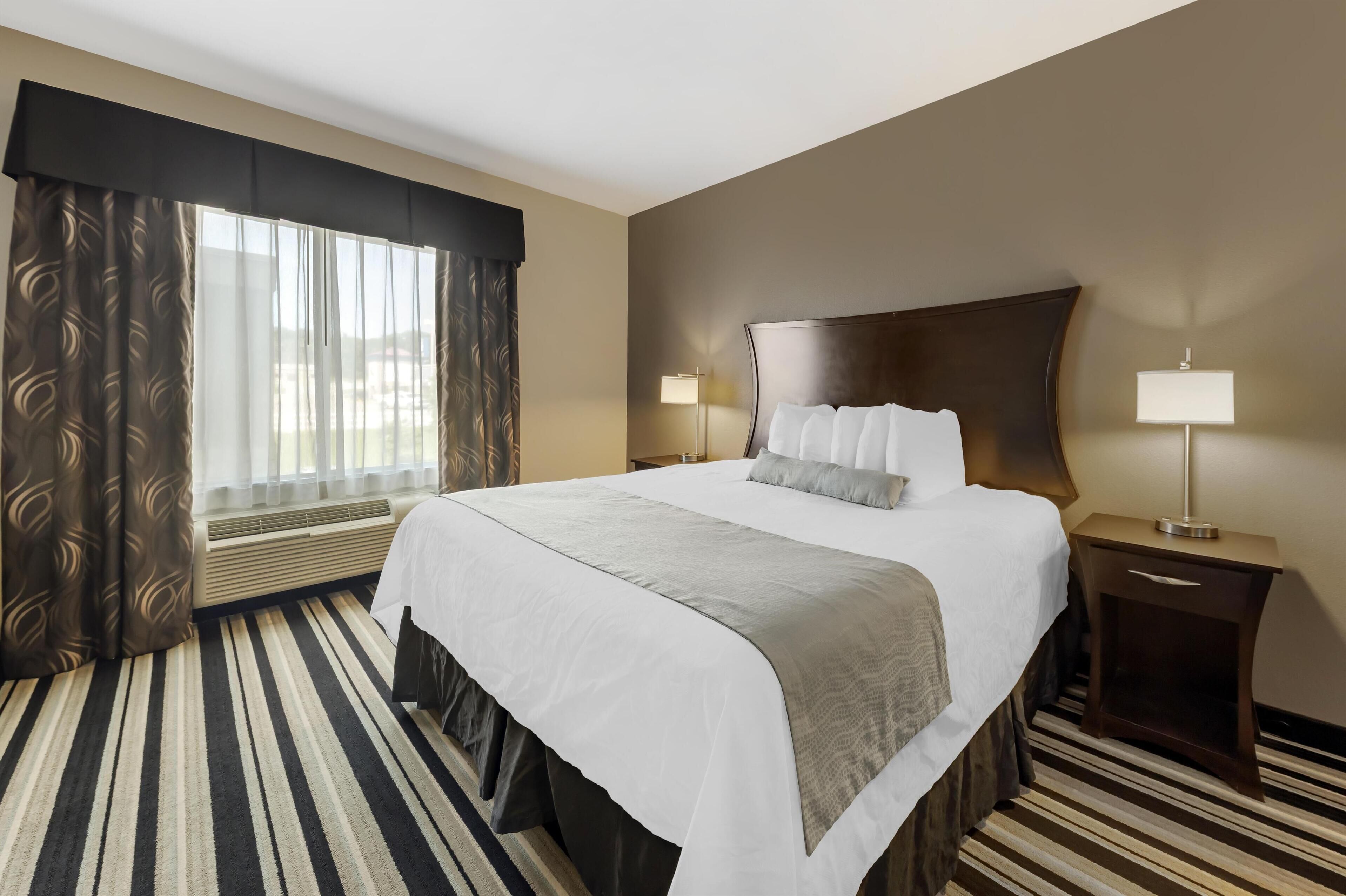 premium bedding, pillow-top beds, desk, laptop workspace