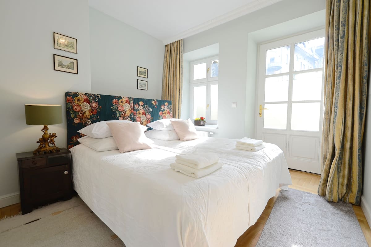 Deluxe Room, Patio | 1 bedroom, pillowtop beds, in-room safe, individually decorated
