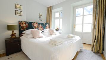Deluxe Room, Patio | 1 bedroom, pillow-top beds, in-room safe, individually decorated