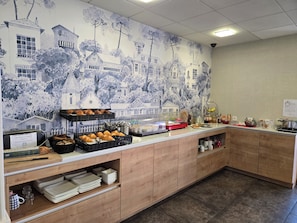 Daily buffet breakfast (EUR 14 per person)