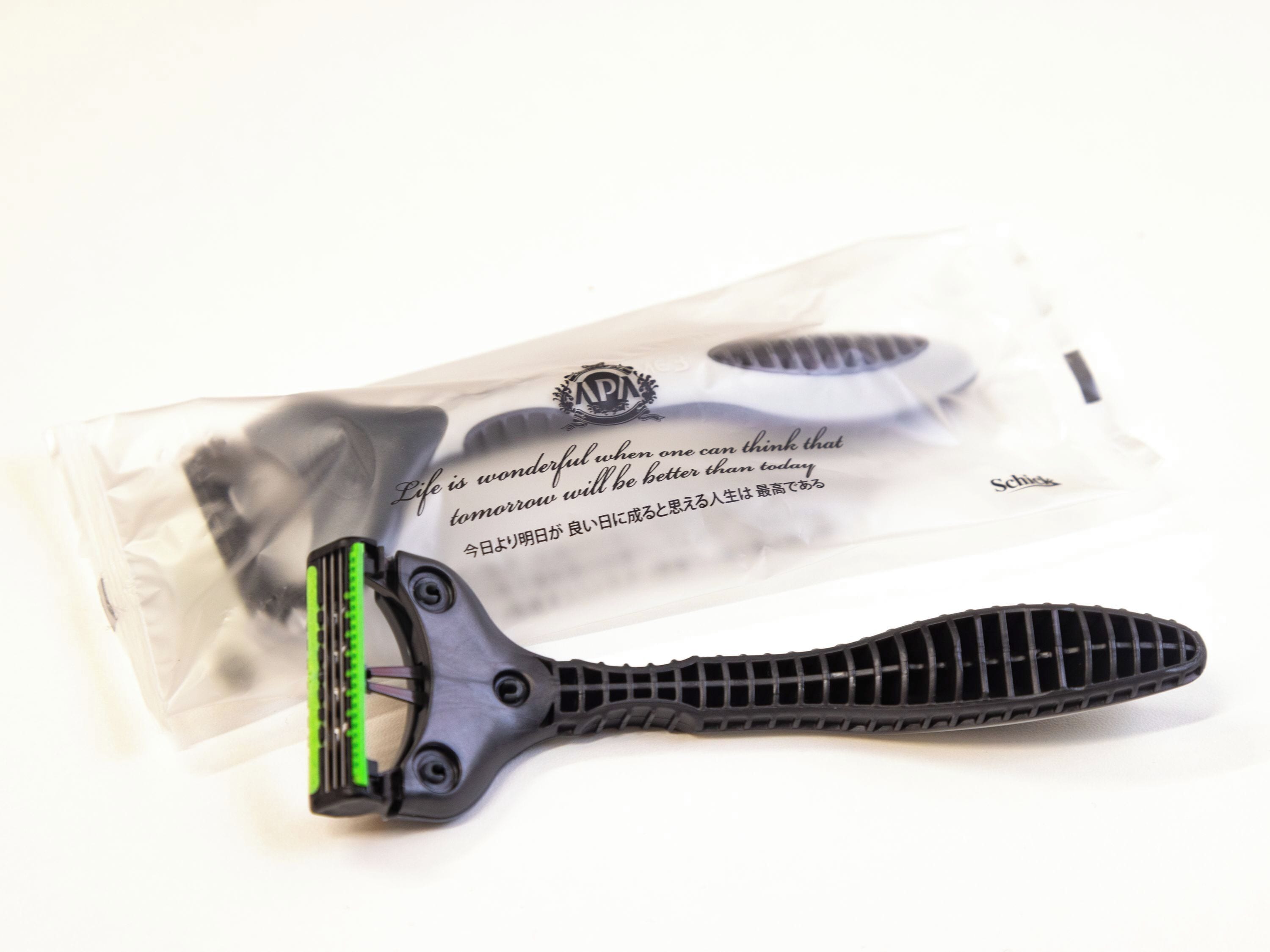 A razor blade and its packaging.