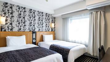 Twin Room, Non Smoking | Down comforters, desk, blackout drapes, free WiFi
