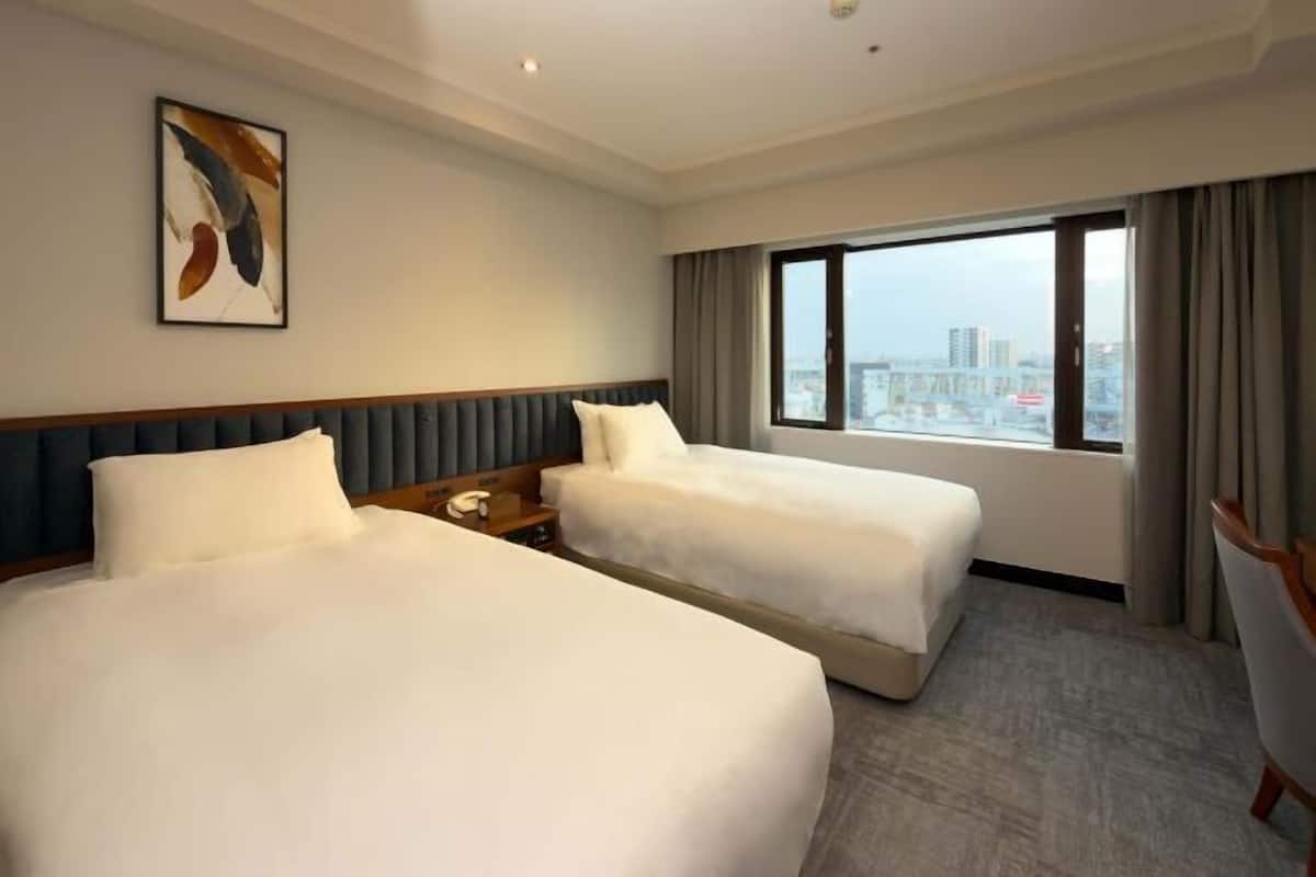 Desk, blackout curtains, soundproofing, free WiFi