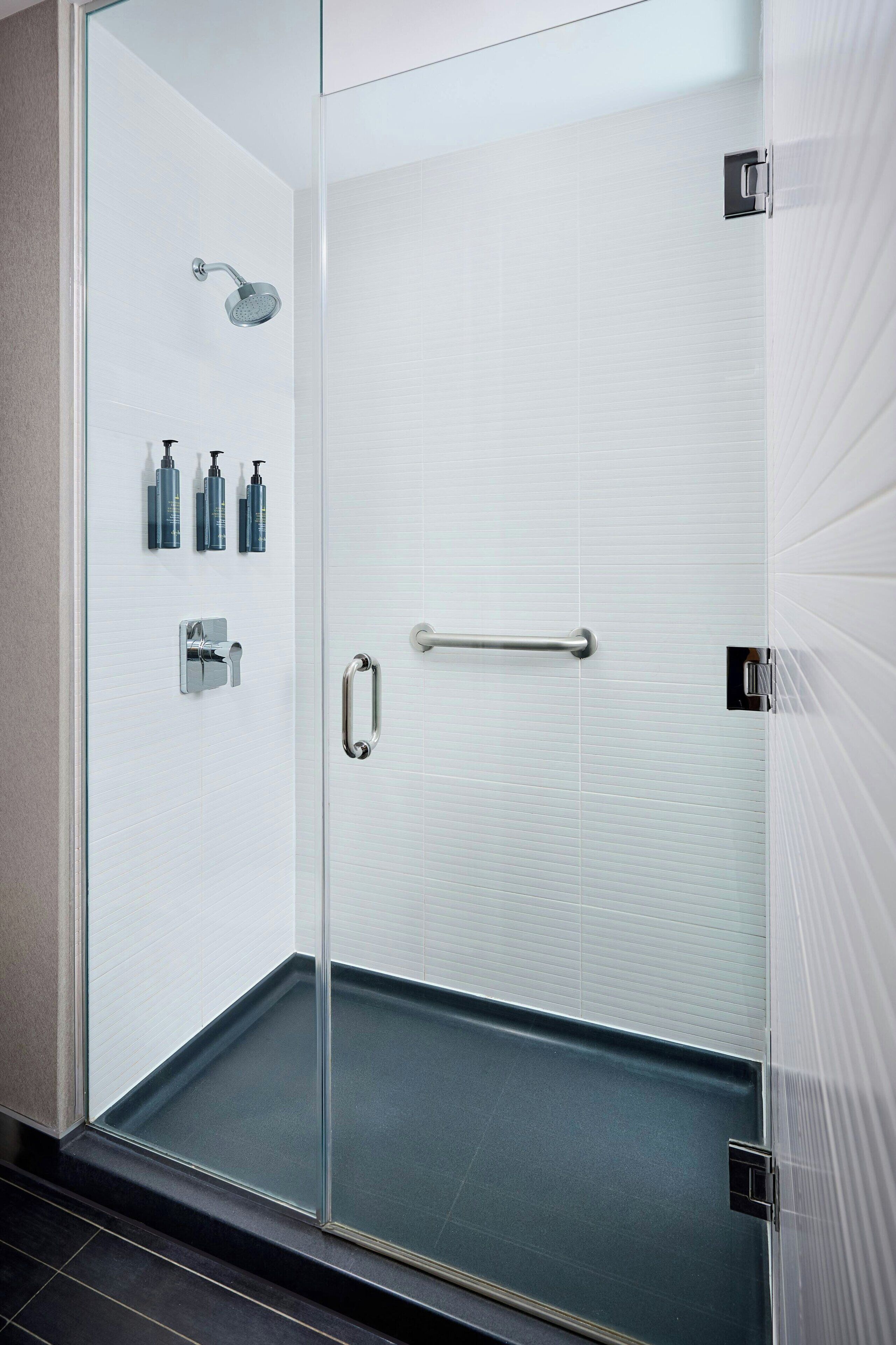 shower, free toiletries, hair dryer, towels