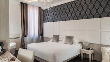 Executive Suite | Premium bedding, down duvets, minibar, individually decorated