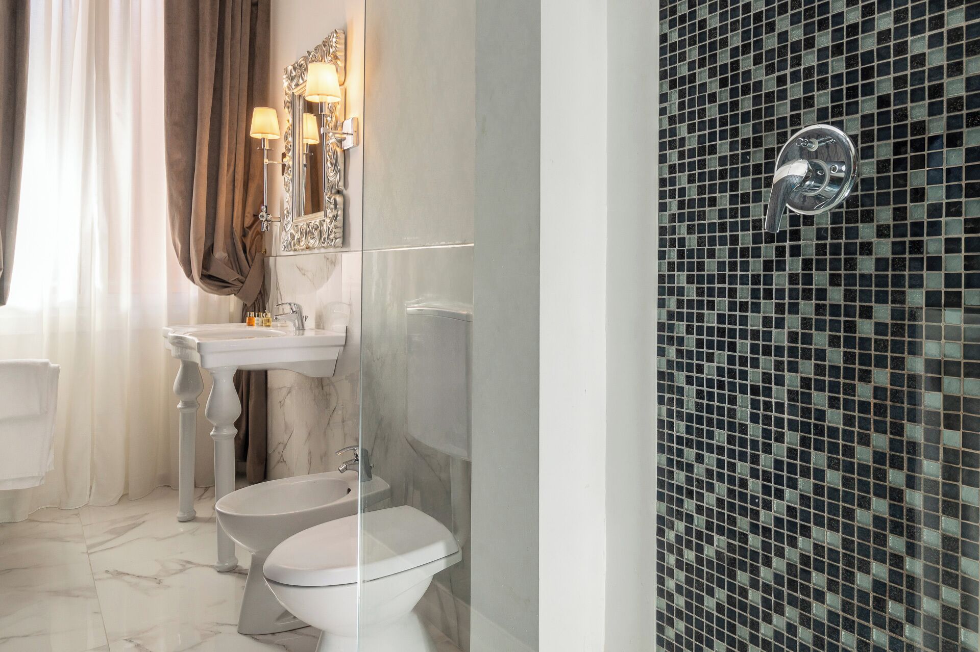 executive suite | bathroom | shower, free toiletries, hair dryer, slippers