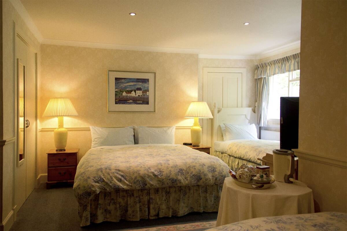 standard quadruple room | egyptian cotton sheets, premium bedding, down duvets