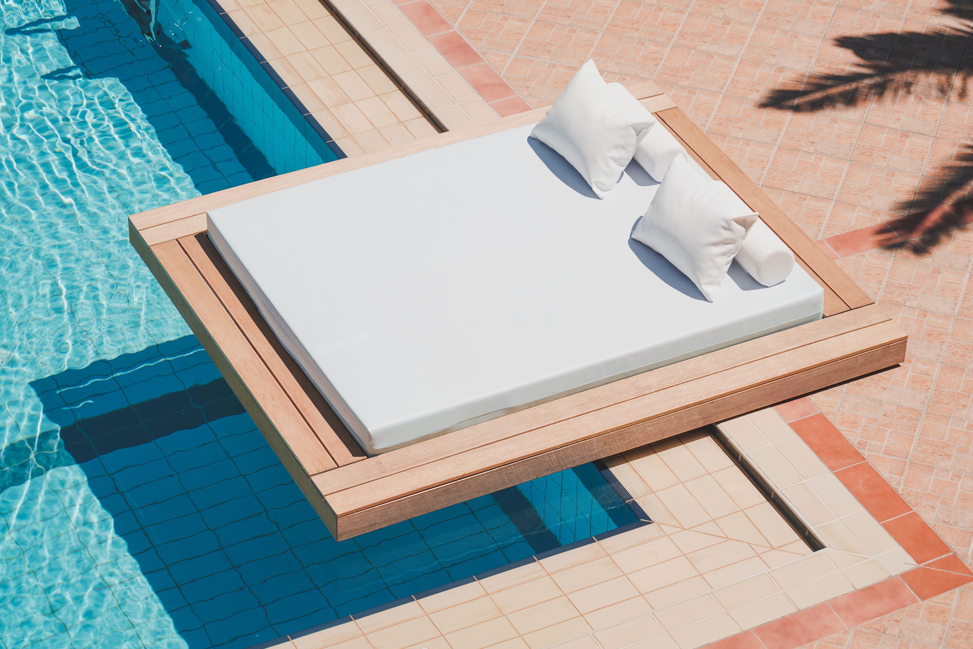Seasonal outdoor pool, open 8:00 AM to 7:00 PM, free cabanas