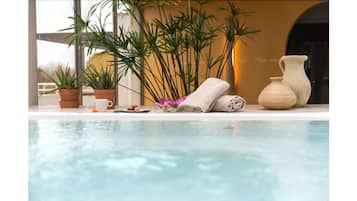 Indoor pool, open 9:00 AM to 9:00 PM, sun loungers