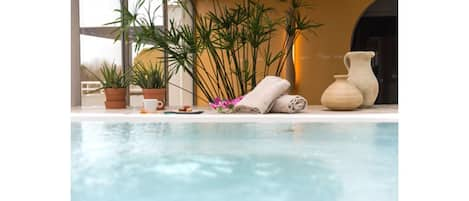 Indoor pool, open 9:00 AM to 9:00 PM, sun loungers