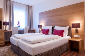 Premium bedding, in-room safe, individually decorated