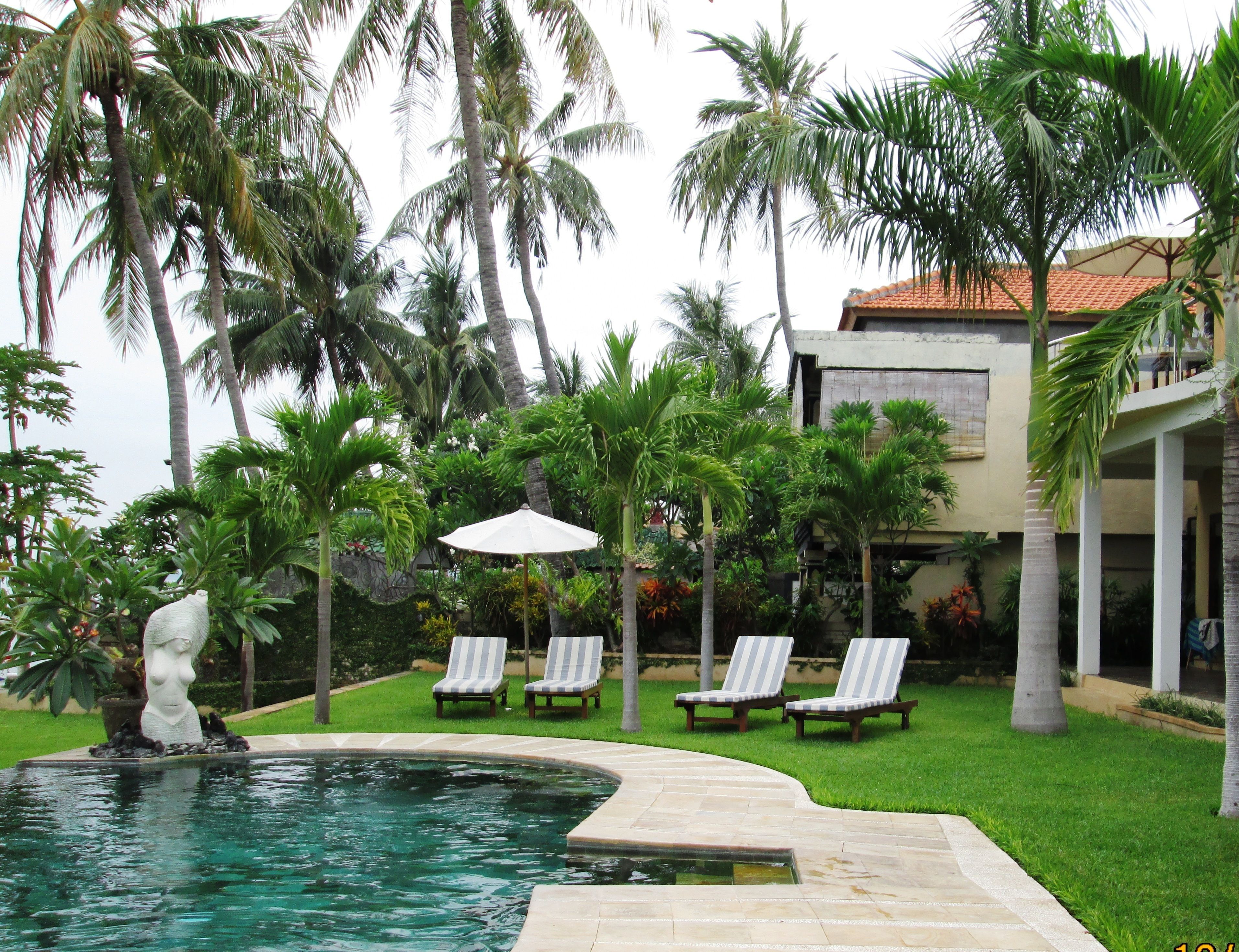 outdoor pool, pool umbrellas, pool loungers
