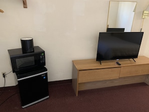 Desk, laptop workspace, blackout curtains, iron/ironing board