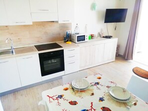 Fridge, microwave, oven, stovetop - Affittimoderni Isola Rossa Cala Serena (Trinità d´Agultu e Vignola)