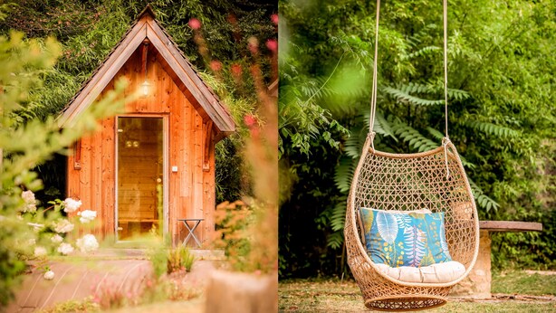 A wooden cabin with a door and a swing chair in a garden. - L'Atelier d'Epicure - Logis (Castels et Bézenac)