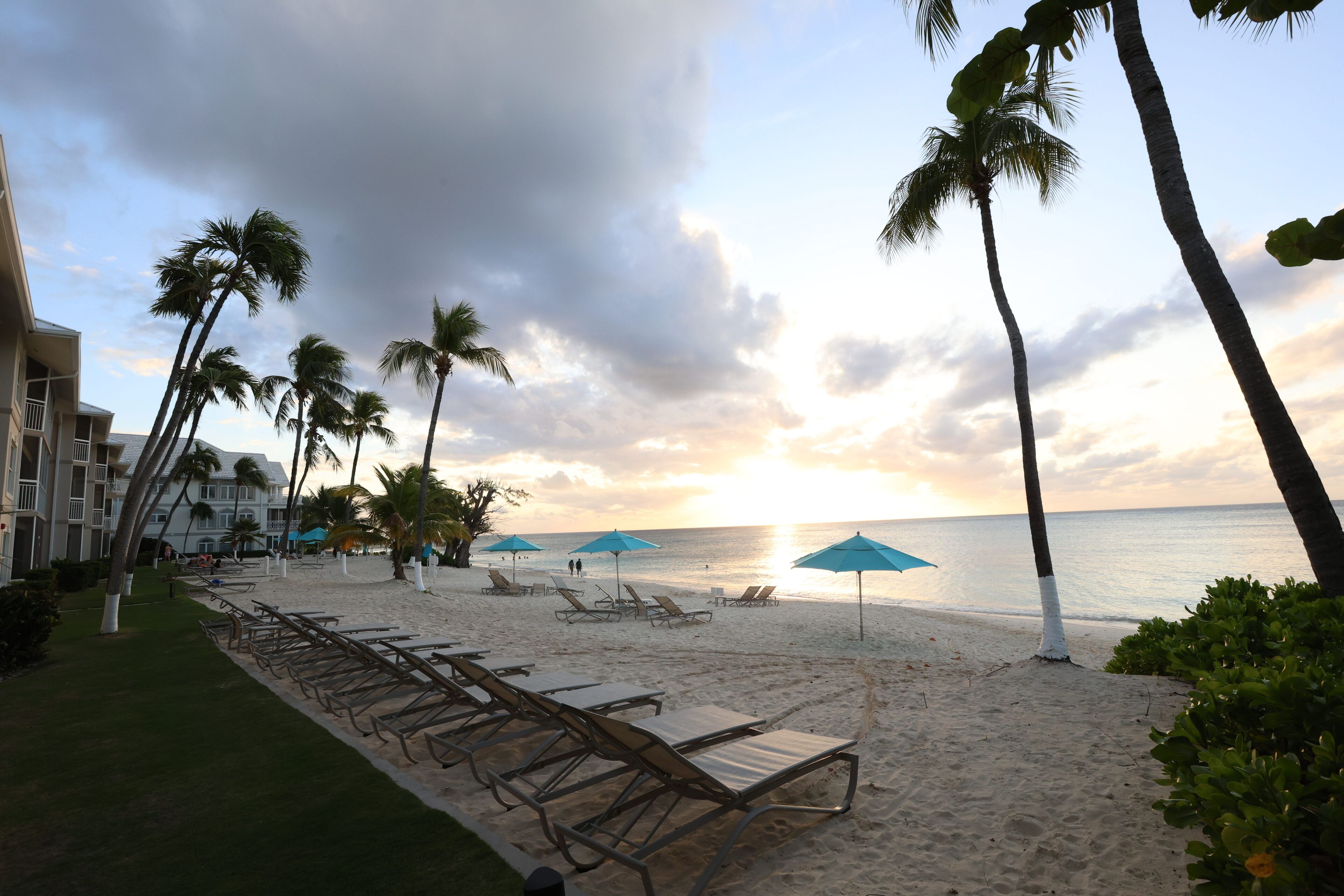 On the beach, sun loungers, beach towels