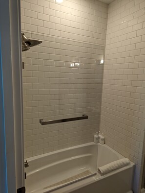 Combined shower/bathtub, hair dryer, towels, soap - Tall trees - modern farmhouse (Big Sky)