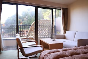 Standard Twin Room with Sofa, Non Smoking | 1 bedroom, in-room safe, laptop workspace, blackout curtains