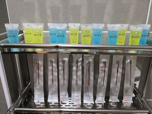 Hair dryer, towels, soap, shampoo