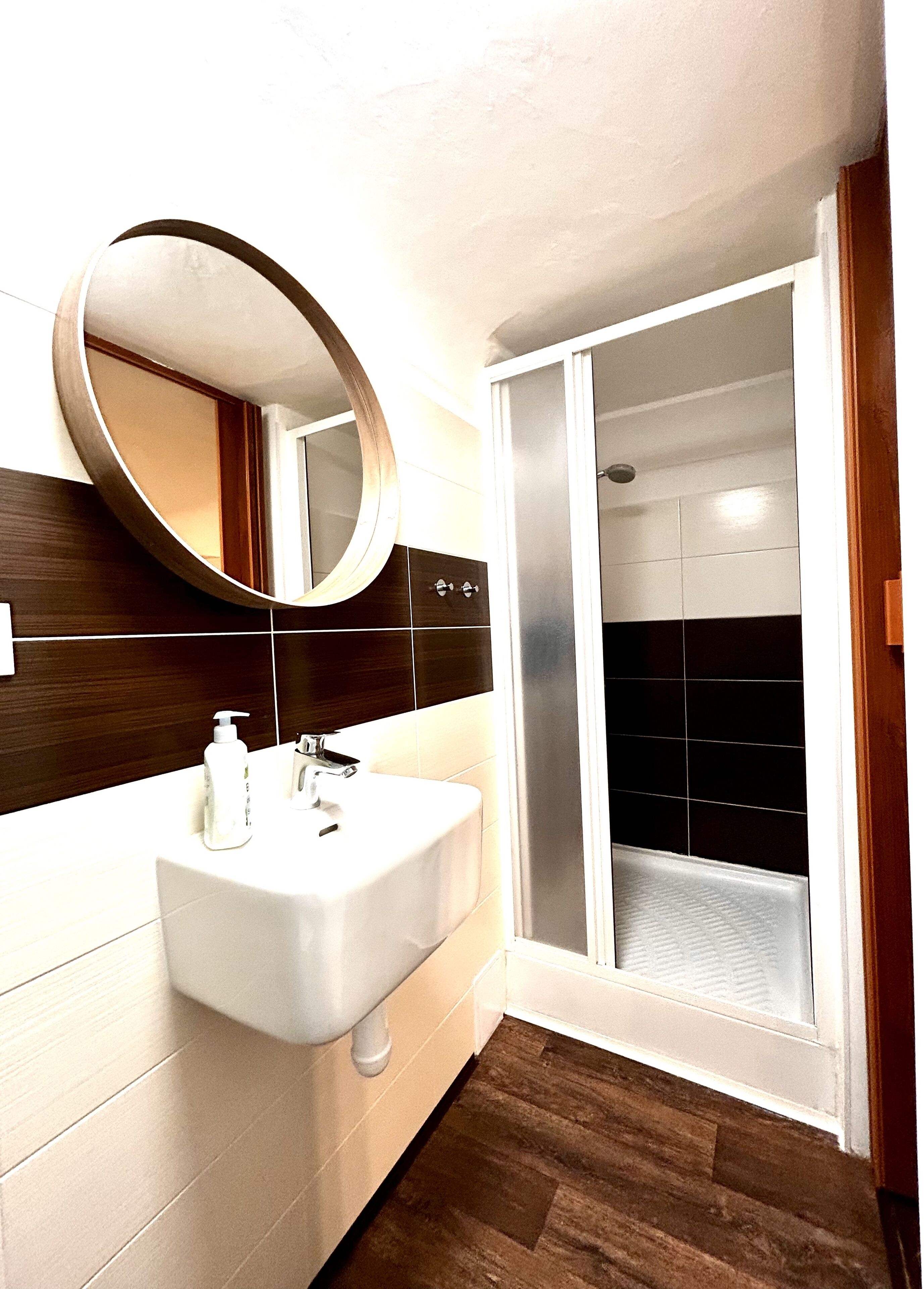 Shower, hair dryer, towels, shampoo