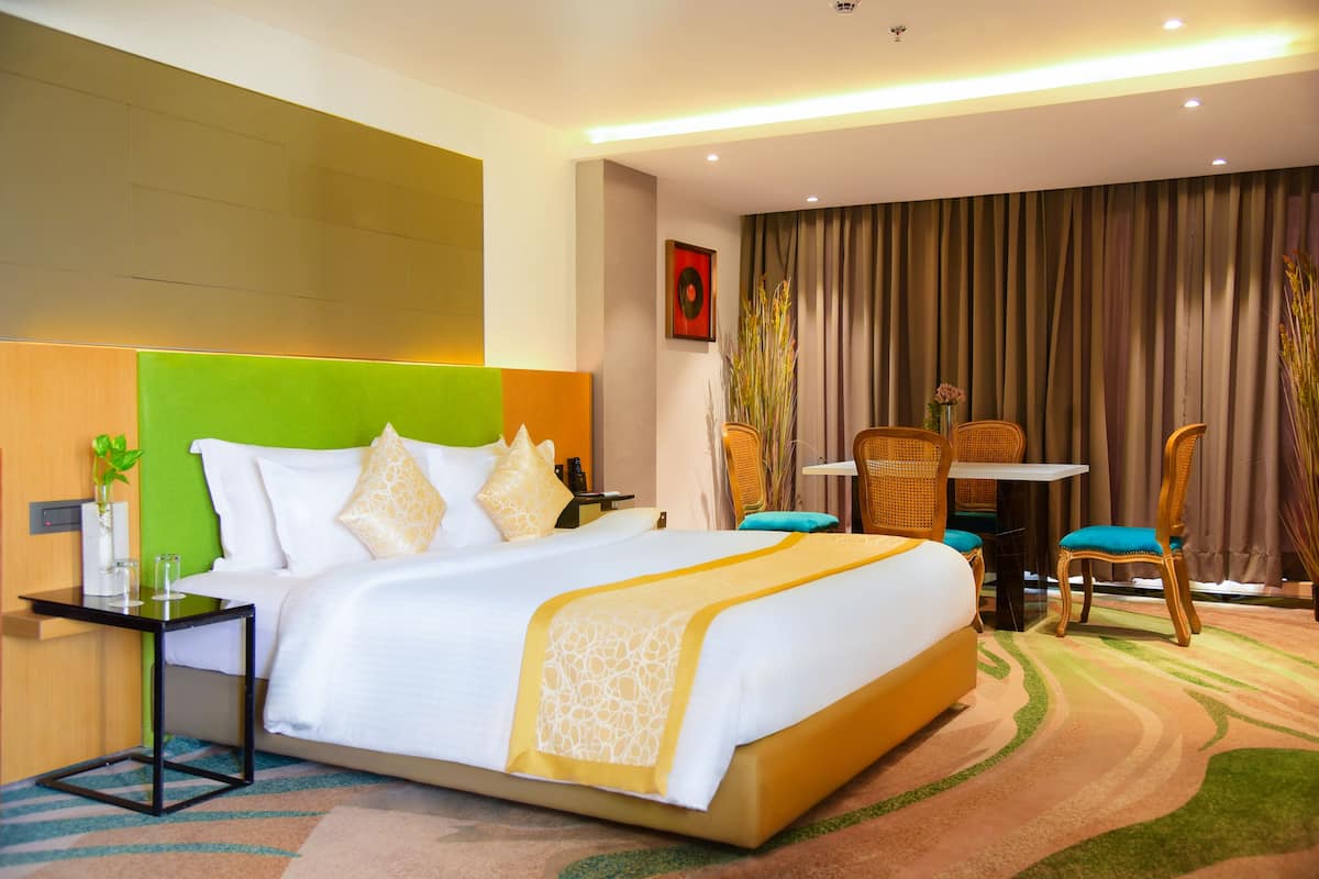 Suite de lujo | Ropa de cama de alta calidad y minibar