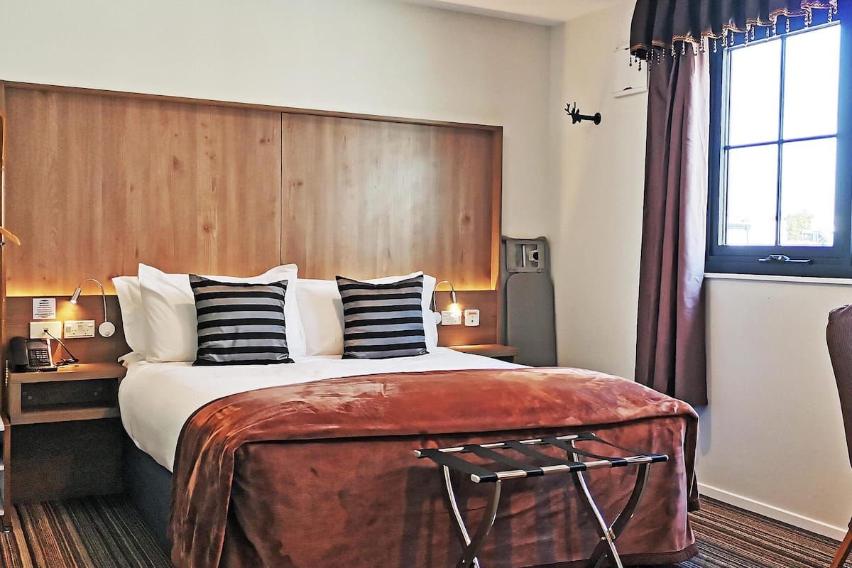 Business Class Queen Studio | Premium bedding, Select Comfort beds, blackout drapes, soundproofing